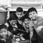 grayscale photo of group of children