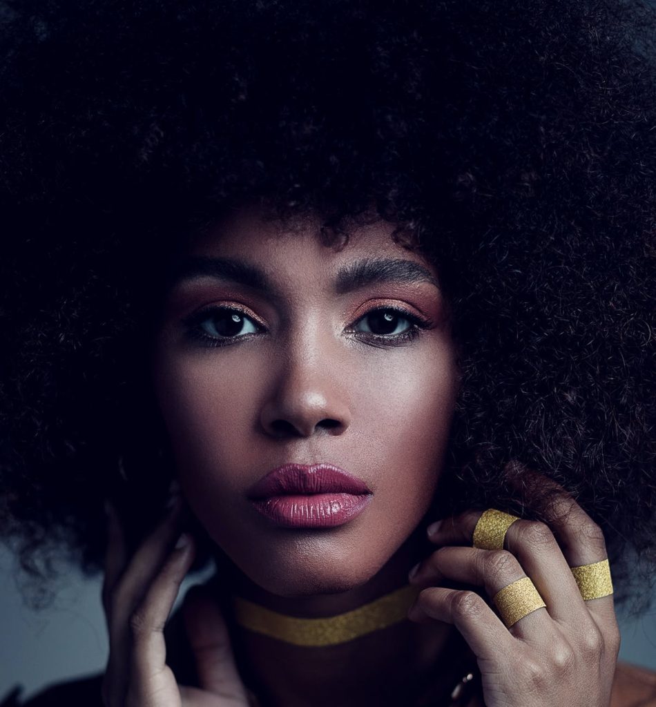 gorgeous young black woman with afro hair
