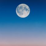 full moon on a blue sky
