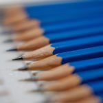 tilt shift lens photography of blue pencils