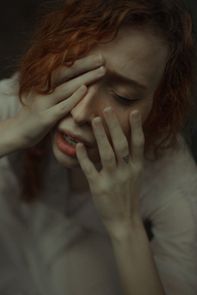 woman face emotion alone