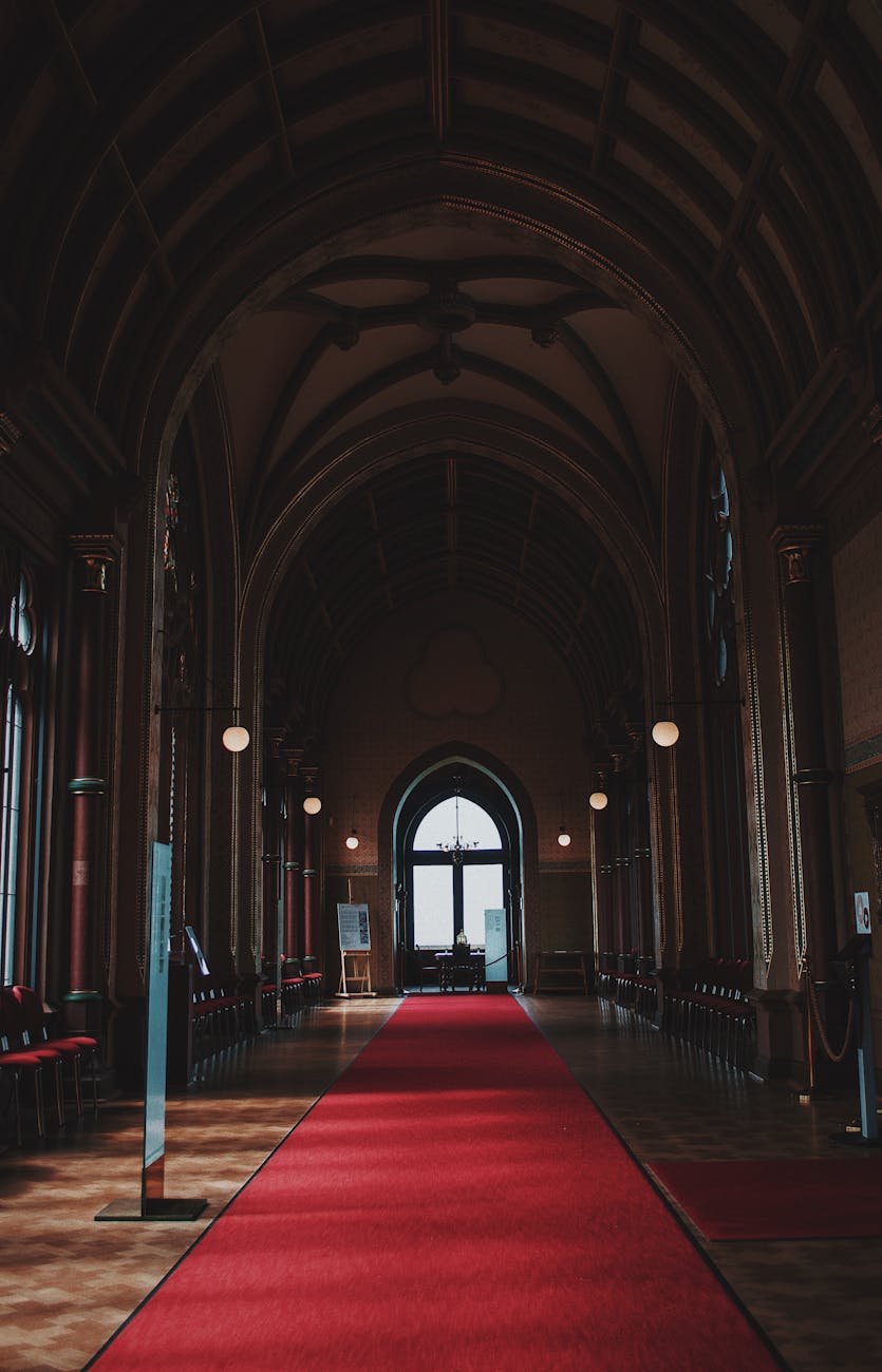 arch cathedral entrance with red carpet